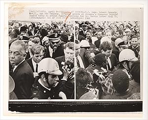 Two 1968 wire press photographs of Robert Kennedy and others at the funeral services for Dr. Mart...