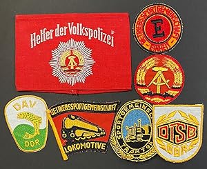 Helfer der volkspolizei [armband for an East German civilian police helper, together with six pat...