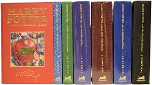 Imagen del vendedor de Harry Potter Series, Complete Deluxe Set, with supplementary works. Being: The Philosopher's Stone; The Chamber of Secrets; The Prisoner of Azkaban; The Goblet of Fire; The Order of The Phoenix; The Half-Blood Prince; The Deathly Hallows; Fantastic Beasts and Where to Find Them; Quidditch Through the Ages; and The Tales of Beedle the Bard a la venta por Adrian Harrington Ltd, PBFA, ABA, ILAB