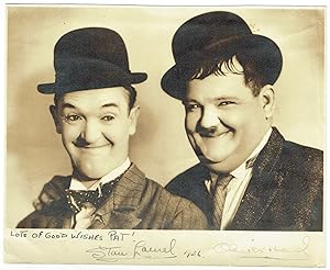 Vintage matte-finish 9.5 x 7.75 photo of Laurel and Hardy side-by-side in their bowler hats, sign...