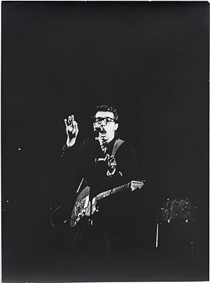 Three original photographs of Elvis Costello onstage, circa 1980s