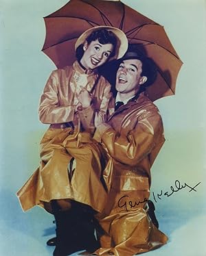 Bild des Verkufers fr Singin' in the Rain movie still of Debbie Reynolds and Gene Kelly, signed zum Verkauf von Antipodean Books, Maps & Prints, ABAA