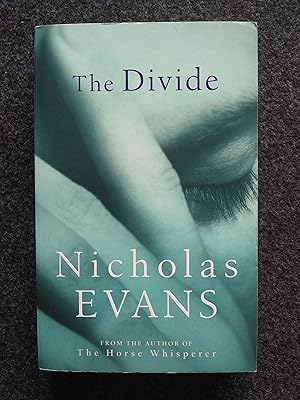 Imagen del vendedor de The Divide a la venta por Shelley's Books