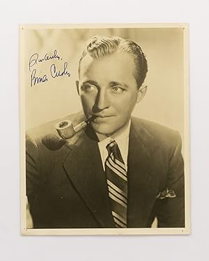 A signed portrait photograph of the popular and influential American singer and actor Bing Crosby...