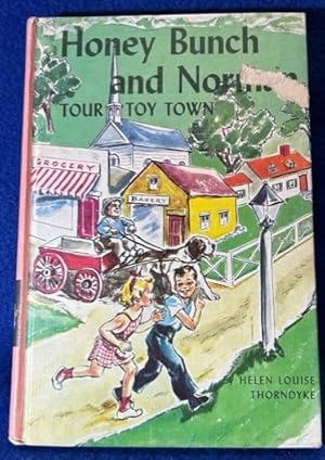 Seller image for Honey Bunch and Norman Tour Toy Town for sale by TNT ENTERPRIZES