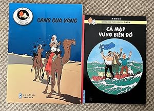 Bild des Verkufers fr Set of 2 Tintin books in Vietnamese from Vietnam. The Crab With The Golden Claws and The Red Sea Sharks. Tintin Foreign Languages (Langues trangres) zum Verkauf von CKR Inc.