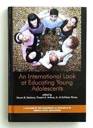 Image du vendeur pour An International Look at Educating Young Adolescents (Handbook of Research in Middle Level Education) mis en vente par Our Kind Of Books