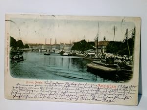 Bild des Verkufers fr Amsterdam. Binnen Amstel. Niederlande. Holland. Alte Ansichtskarte / Lithographie farbig, gel. 1900. Blick ber den Kanal, Schiffe, Brcke, Gebude. zum Verkauf von ABC Versand e.K.