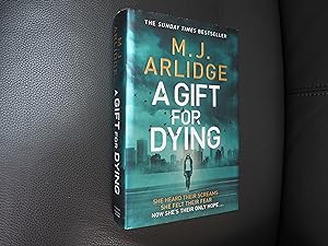 Seller image for A GIFT FOR DYING for sale by Ron Weld Books