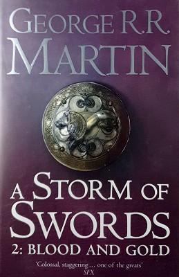 Image du vendeur pour A Storm Of Swords, Book Three Of A Song Ice And Fire. Part Two, Blood And Gold mis en vente par Marlowes Books and Music