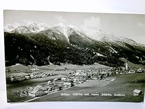 Bild des Verkufers fr Sillian mit Helm. Osttirol. sterreich. Alte Ansichtskarte s/w., ungel. ca 40 / 50ger Jahre ?. Blick ber Ort u. Umland, Gebirge im Hintergrund. zum Verkauf von ABC Versand e.K.