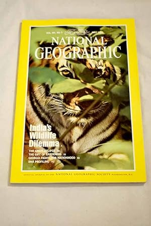 Imagen del vendedor de National Geographic Magazine, Ao 1992, vol. 181, n 5:: India's wildlife dilemma; The darkness that enlightens; The moon's racing shadow; The gift of gardening; Georgia fights for nationhood; DNA profiling, the new science of identity a la venta por Alcan Libros