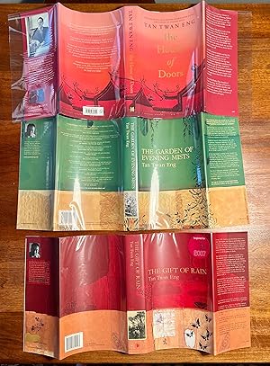 Seller image for THE HOUSE OF DOORS/ THE GARDEN OF EVENING MISTS AND THE GIFT OF RAIN/ALL THREE BOOKS HAVE BEEN LONG LISTED FOR THE BOOKER PRIZE/2023,2017 AND 2007.ALL ARE FIRST PRINTING AND ARE SIGNED AND OR DATED AND OR LINED TO THE TITLE PAGES for sale by m&g books