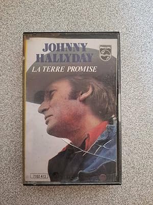 Bild des Verkufers fr Cassette Audio - Johnny Hallyday : La Terre Promise zum Verkauf von Dmons et Merveilles