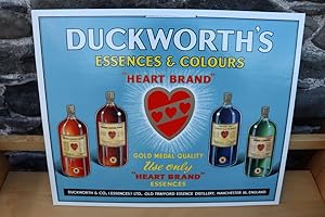 An advertisement for 'Duckworth's essences and colours "heart brand." Gold medal quality. Use onl...