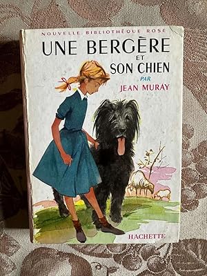 Seller image for Une bergre et son chien for sale by Dmons et Merveilles