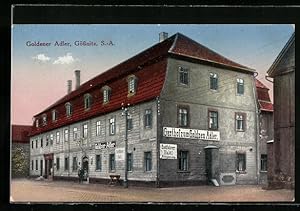 Ansichtskarte Gössnitz /S.-A., Gasthof zum Goldnen Adler - Strassenansicht mit Krippe