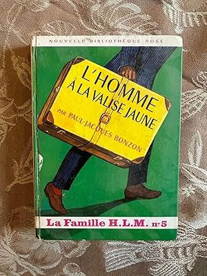 Image du vendeur pour L'homme a la valise jaune mis en vente par Dmons et Merveilles