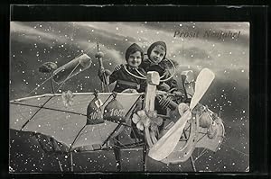 Imagen del vendedor de Ansichtskarte Zwei kleine Schornsteinfeger im Flugzeug im Schnee, Neujahrsgruss a la venta por Bartko-Reher