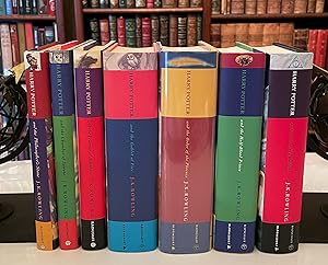 Image du vendeur pour HARRY POTTER, complete 7 volume set {including Four 1st editions, 1st printing} The Philosopher's Stone; The Chamber of Secrets; The Prisoner of Azkaban; Goblet of Fire; Order of the Phoenix; Half-Blood Prince; The Deathly Hallows mis en vente par Foley & Sons Fine Editions