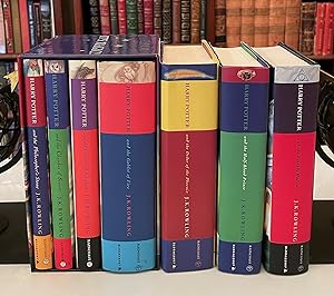 Imagen del vendedor de HARRY POTTER, complete 7 volume set with 1st four books in slipcase {including Three 1st editions, 1st printing} The Philosopher's Stone; The Chamber of Secrets; The Prisoner of Azkaban; Goblet of Fire; Order of the Phoenix; Half-Blood Prince; The Deathly Hallows a la venta por Foley & Sons Fine Editions