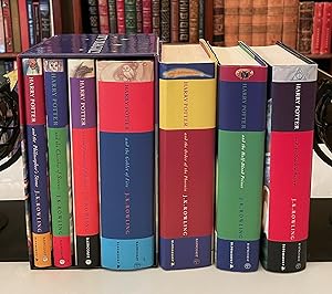 Image du vendeur pour HARRY POTTER, complete 7 volume set with 1st four books in slipcase {including Three 1st editions, 1st printing} The Philosopher's Stone; The Chamber of Secrets; The Prisoner of Azkaban; Goblet of Fire; Order of the Phoenix; Half-Blood Prince; The Deathly Hallows mis en vente par Foley & Sons Fine Editions