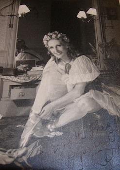Autographed B&W Photo of Lycette Darsonval backstage donning costume for "Les Deux Pigeons."