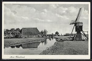 Ansichtskarte Friesland, Windmühle am Ufer