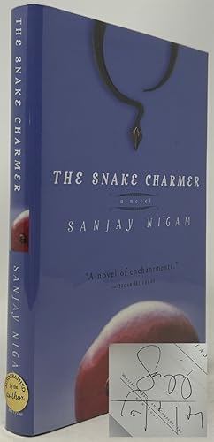 Imagen del vendedor de The Snake Charmer: A Novel a la venta por Oddfellow's Fine Books and Collectables