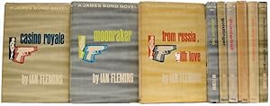 Bild des Verkufers fr Dollar Mystery Guild Uniform edition of the James Bond novels. A complete set. Comprising Casino Royale, Moonraker, From Russia With Love, Dr. No, Goldfinger, Thunderball, The Spy Who Loved Me, You Only Live Twice and The Man with the Golden Gun (all that were published) zum Verkauf von Adrian Harrington Ltd, PBFA, ABA, ILAB