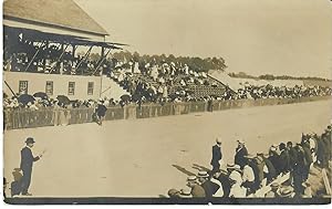 [Real Photo Postcard: Racetrack and Grandstand]