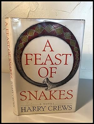 Image du vendeur pour A Feast of Snakes mis en vente par James Graham, Bookseller, ABAA