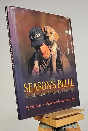 Immagine del venditore per Season's Belle : a Labrador Retriever's First Year venduto da Henniker Book Farm and Gifts