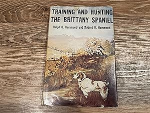 Bild des Verkufers fr Training and Hunting the Brittany Spaniel zum Verkauf von Betty Mittendorf /Tiffany Power BKSLINEN