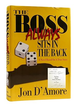 Seller image for THE BOSS ALWAYS SITS IN THE BACK SIGNED for sale by Rare Book Cellar