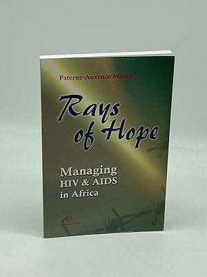 Seller image for RAYS of HOPE MANAGING HIV & AIDS in AFRICA : AJAN - CARITAS HANDBOOK on the MEDICAL and NUTRITIONAL TREATMENT of HIV and AIDS : SECOND REVISED EXPANDED EDITION for sale by True Oak Books