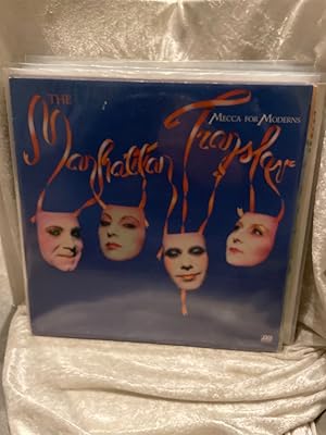 Bild des Verkufers fr Manhattan Transfer - Mecca For Moderns (Vinyle, 33 tours LP 12" - Edition europenne: Atlantic Recording Corporation / WEA Records LTD. / Warner Communications Company ATL 50 791 - MS/MT 5634-2, 1981) On the Boulevard - Boy from New York City - (Wanted) Dead or Alive - Spies in the night - Smile again - Until I met You (Corner Pocket) - (The Word of) Confirmation - Kafka - A Nightingale sang in Berkeley Square zum Verkauf von Antiquariat Jochen Mohr -Books and Mohr-
