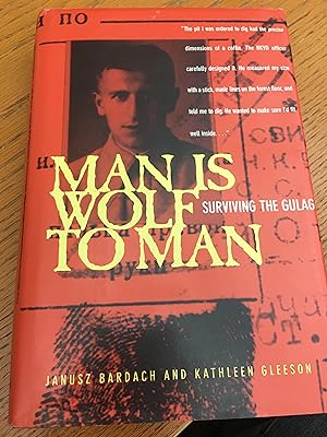 Man Is Wolf to Man: Surviving the Gulag. Signed x 2.