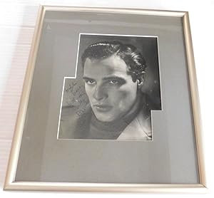A RARE INSCRIBED AND SIGNED PHOTOGRAPH OF A YOUTHFUL MARLON BRANDO.