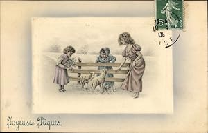 Präge Ansichtskarte / Postkarte Glückwunsch Ostern, Kinder füttern Lämmer