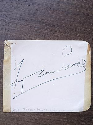 Card signed by Tyrone Power on one side and by Lilian Harvey on the other. (autograph / autographe)