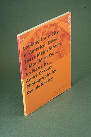 Seller image for Looking for a city in America: down these mean streets a man must go : an essay. Photographs by Dennis Keeley ; preface by Kurt W. Forster for sale by Steven Wolfe Books