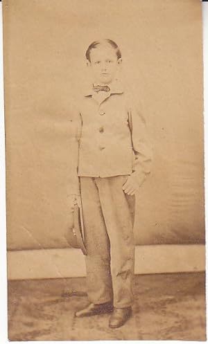 An Albumen Photograph of a Young Boy With Hat and Bow Tie