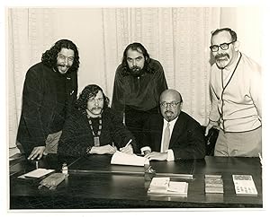 Bild des Verkufers fr [Publicity photo]: The Fugs signing a music contract zum Verkauf von Between the Covers-Rare Books, Inc. ABAA