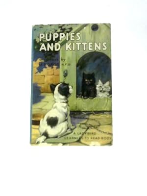 Seller image for Puppies and Kittens for sale by World of Rare Books