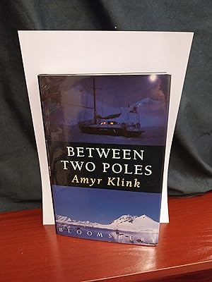 Image du vendeur pour Between Two Poles mis en vente par Gemini-Books