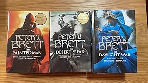 Imagen del vendedor de The Painted Man, The Desert Spear, The Daylight War. A matching signed, numbered, avatar embossed set of UK first editions, first printings of the first three books in the Demon Cycle. a la venta por Signed and Delivered Books