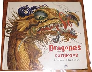 Imagen del vendedor de DRAGONES CARIOSOS Ilustrado con multitud de lminas a toda pgina color a la venta por CALLE 59  Libros