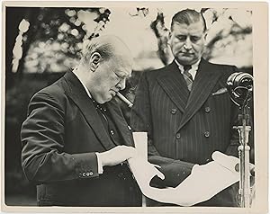 An original Second World War press photograph of British Prime Minister Winston S. Churchill rece...