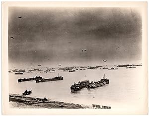 A Second World War Official U.S. Navy photograph showing Allied landings in Normandy, France on D...